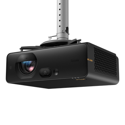 A black BenQ AK800ST 4K Short-Throw Laser Golf Simulator Projector mounted to a ceiling pole.