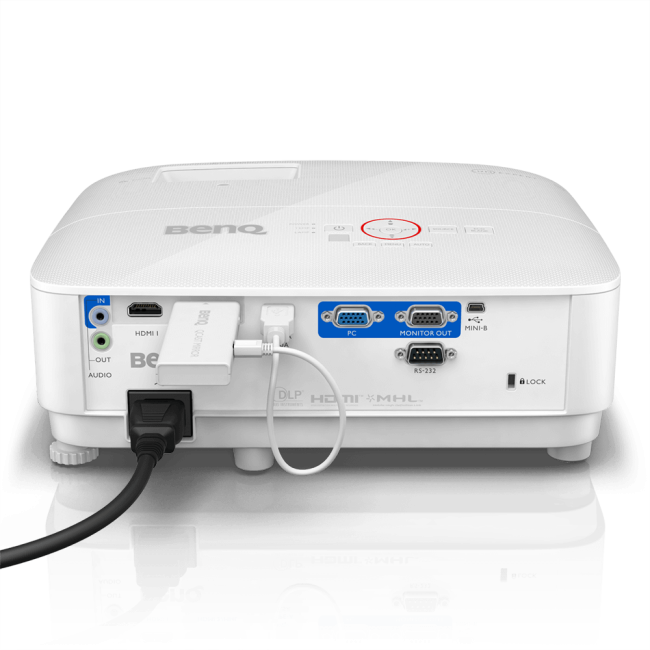 Back panel of the white BenQ TH671ST 1080P 3000 Lumens Short Throw Gaming Projector, showing a power cord, a wireless dongle, and various HDMI, PC, and audio input/output ports.